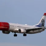 A Norwegian Plan returns their drawers after one of his tires have exploited during the takeoff

 Arabausa