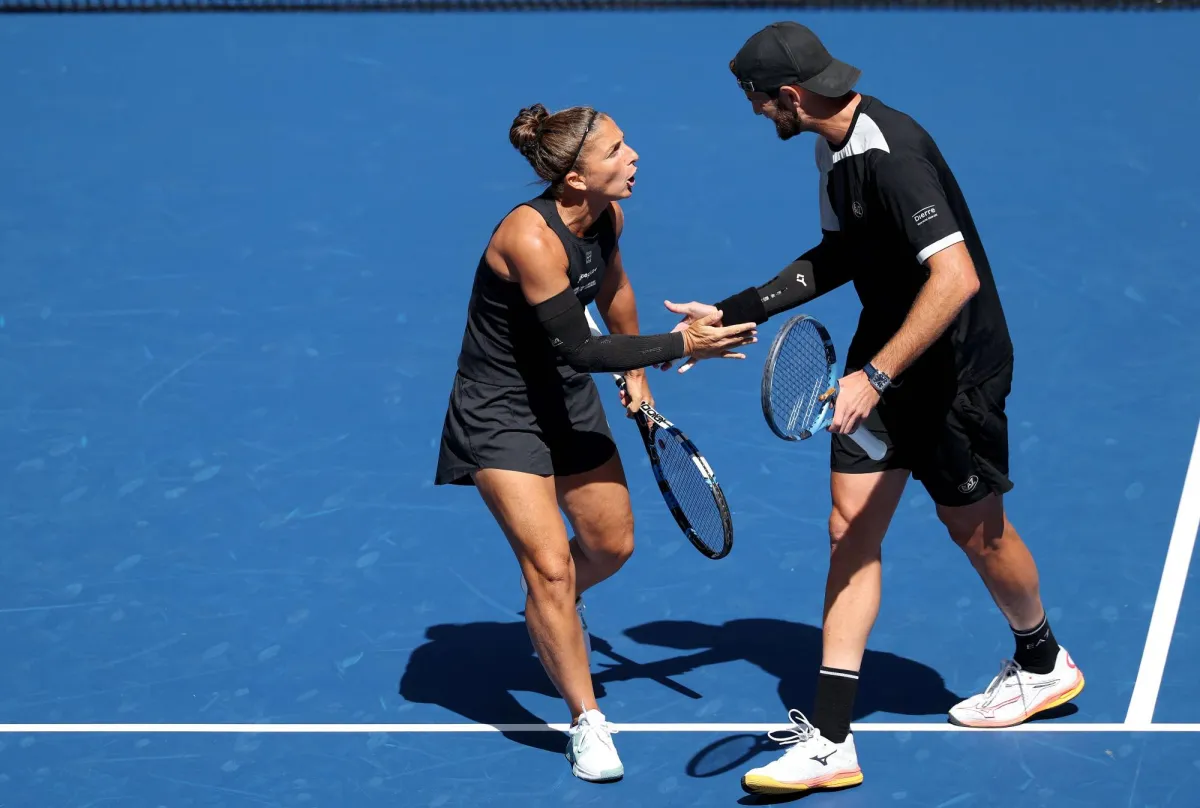 Iranian progress and fate in the double mixed
Arabausa